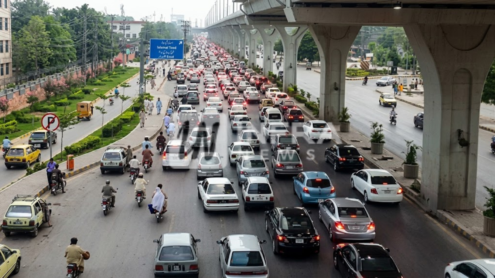 Traffic moving along Murree Road in Rawalpindi beneath the Metro Bus elevated track